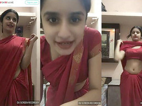 Slutty cam girl shows off her navel and exposes herself in a cute way
