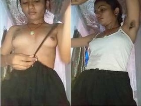 Watch a beautiful girl show off her breasts