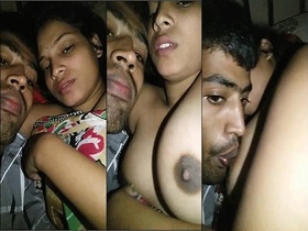 Young and beautiful girl sucks on her own nipples