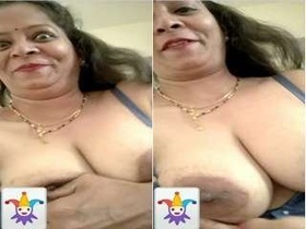 Desi bhabi flaunts her big breasts in a steamy video