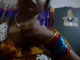 Aunt From Salem flaunts her breasts while playing with her poop