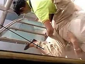 Desi auntie caught in the act of being groped by a coworker on the mall stairs