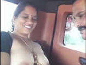 Indian bhabhi gives oral pleasure to her partner's breasts