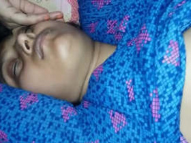 Husband catches wife sleeping naked in bed and films her