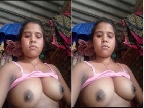 A stunning country girl flaunts her large breasts and pleasures herself with her hands