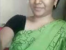 Hot bhabhi flaunts her breasts in a sensual video