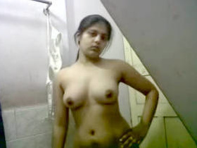 Indian girl with big breasts and wet pussy in bathroom