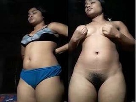 Hot Indian babe pleasures herself with body oil