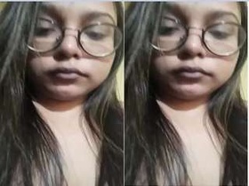 Horny Indian girl flaunts her big tits and moist vagina