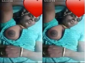 Mature woman flaunts her large breasts during video chat