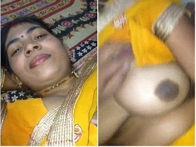 Randy Bhabha's seductive pose with her bosom