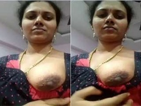 Cute Indian wife flaunts her breasts in a steamy video