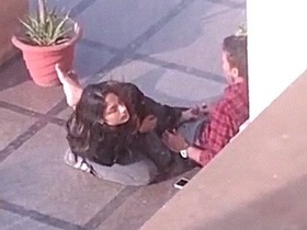 Desi girl pleasures a man outdoors in a public place