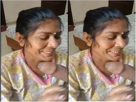 Randi Bachbhi gives a blowjob to a man with a large penis