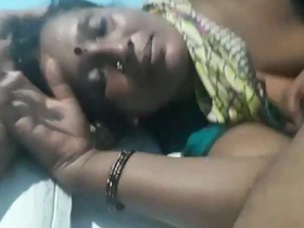 Mature woman enjoys steamy sex with younger lover in a hotel room