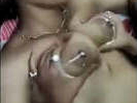 Bhabhi gets her lover's cock hard with her breasts