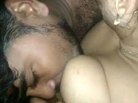 Beautiful couple indulges in erotic romance with tit sucking