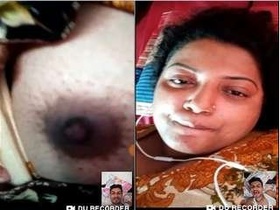 Desi bhabhi reveals her breasts to her partner in a private video call