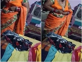 Indian housewife undressing and dressing up