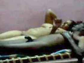 Indian couple enjoys intimate moments on bed after passionate sex