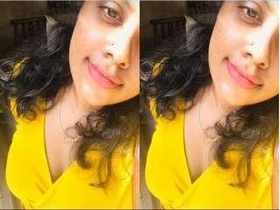 Cute Indian woman flaunts her bosom and moist vagina