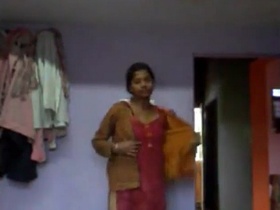 Indian girl strips down to her lingerie in front of camera