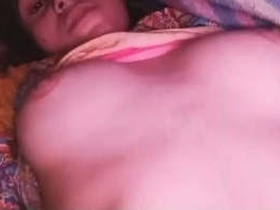 A young Indian woman from a small town flaunts her untouched breasts