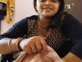 Fat Indian wife pleasures herself on camera