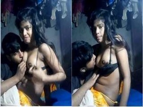 Indian girl gives oral pleasure to her partner's breasts