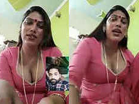 Desi Aunty's Barely Covered Cleavage in a Steamy Show