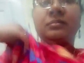 Watch a sexy Tamil aunty stay naked at home in this steamy video