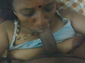 Indian wife gives a blowjob in the village