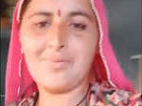 Indian wife flaunts her big boobs and curvy body in a village setting