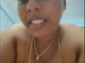 Tamil aunty fucking her big boobs