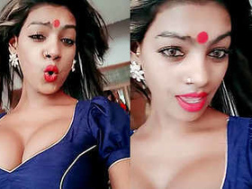 Indian girl with big tits gets naughty in a steamy video