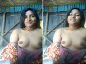 Exclusive video of shy Desi revealing her natural breasts