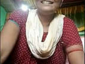 Desi bhabhi flaunts her ample bosom in a village setting
