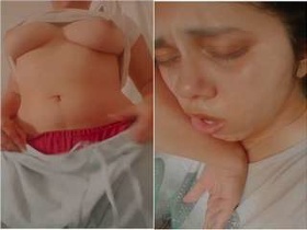 Exclusive video of a hot Indian girl exposing her breasts and vagina