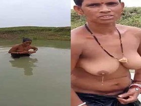 Pure desi wife swims topless in a pond, caught on camera