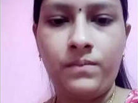 Desi bhabi flaunts her big tits in a village setting