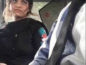 Lovely Desi girl in a car