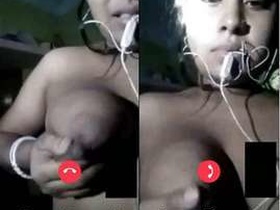 Indian wife flaunts her big breasts in a steamy video call