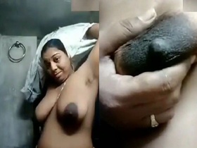 Mature Indian woman flaunts her large breasts
