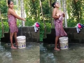 Village girl takes a bath in the great outdoors