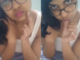 Amateur Indian girl pleasures herself with fingers and tongue in selfie video
