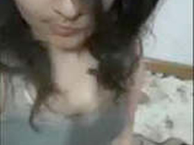 Cute girl flaunts her big boobs in this steamy video