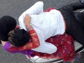 Desi girl and boy share a passionate kiss on the road