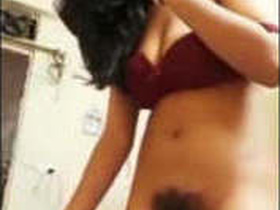 Desi girl moans with pleasure as she fingers her tight hole
