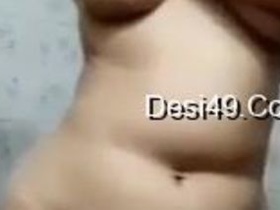 Desi Indian girl films X-rated video in bathroom