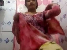 Nude Indian girl takes a bathroom selfie